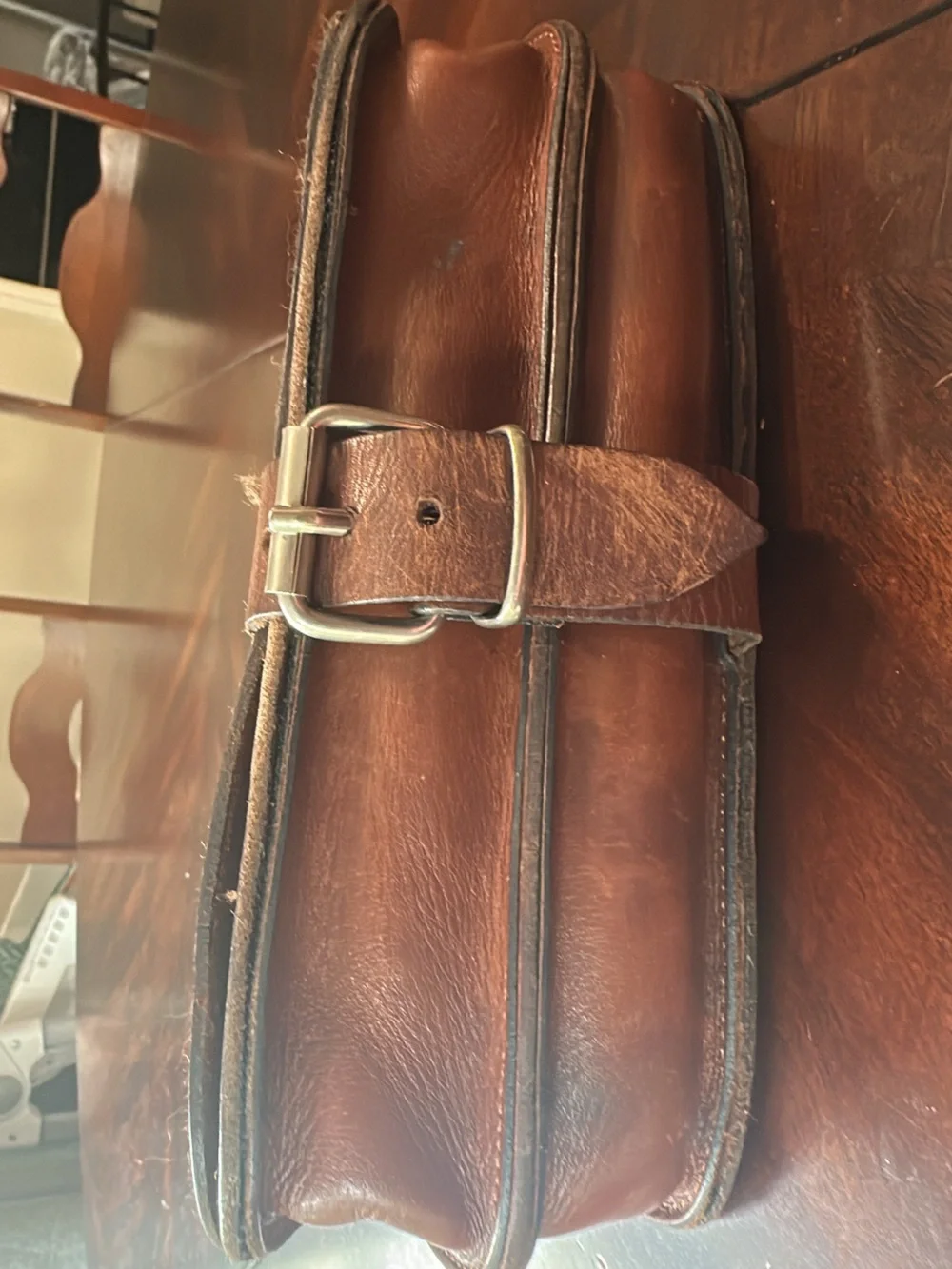 Classic Brown Leather bag- Stylish Buckle Closure. No straps no info about it.